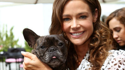 denise richards became a hollywood face for shelter dogs introducing rescued animals through best friends adoption campaign