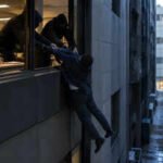 italian banker accidentally dropped to death when thugs were dangling him out of his office window ai image