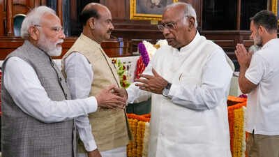 pm modi with rajya sabha lop mallikarjun kharge file photo