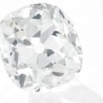 woman who bought a 10 ring at a london flea market and wore it for decades sees its 2627 carat diamond sell for 656750