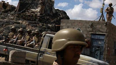 yemeni soldiers stand guard at a military camp near the frontline with houthis in marib yemen